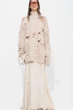BEIGE DISTRESSED TURTLENECK WITH FEATHERS
