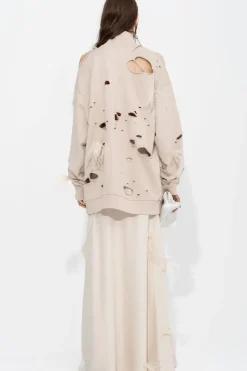 BEIGE DISTRESSED TURTLENECK WITH FEATHERS