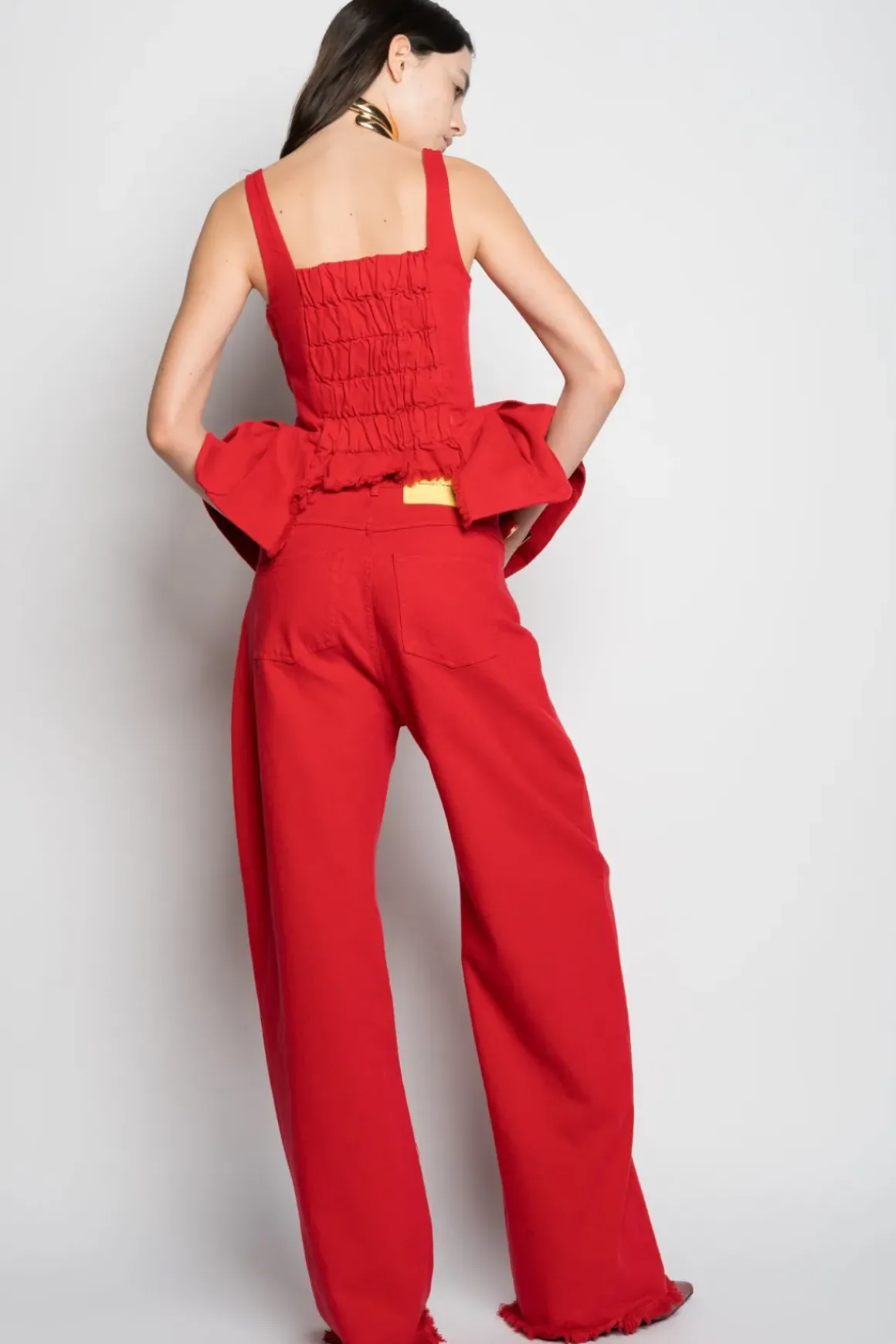 RED CORSET WITH PLEATED HIP PANELS