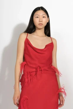 RED SLIP TOP WITH FEATHERS