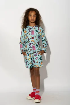 TURQUOISE SQUIGGLE PRINT LONG SLEEVE SWIM TOP