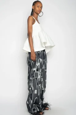 WHITE SLEEVELESS PUFF HEM TOP
