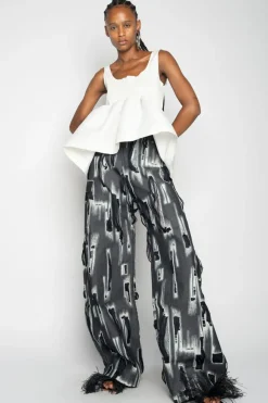 WHITE SLEEVELESS PUFF HEM TOP