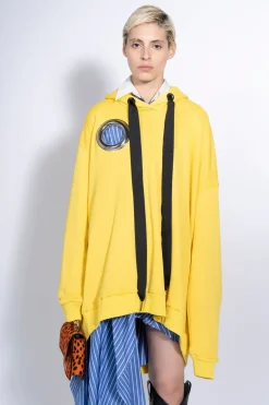 YELLOW ASYMMETRIC HOODIE WITH BIG EYELET